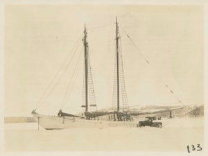 Image: Bowdoin in winter quarters with snowmobile alongside